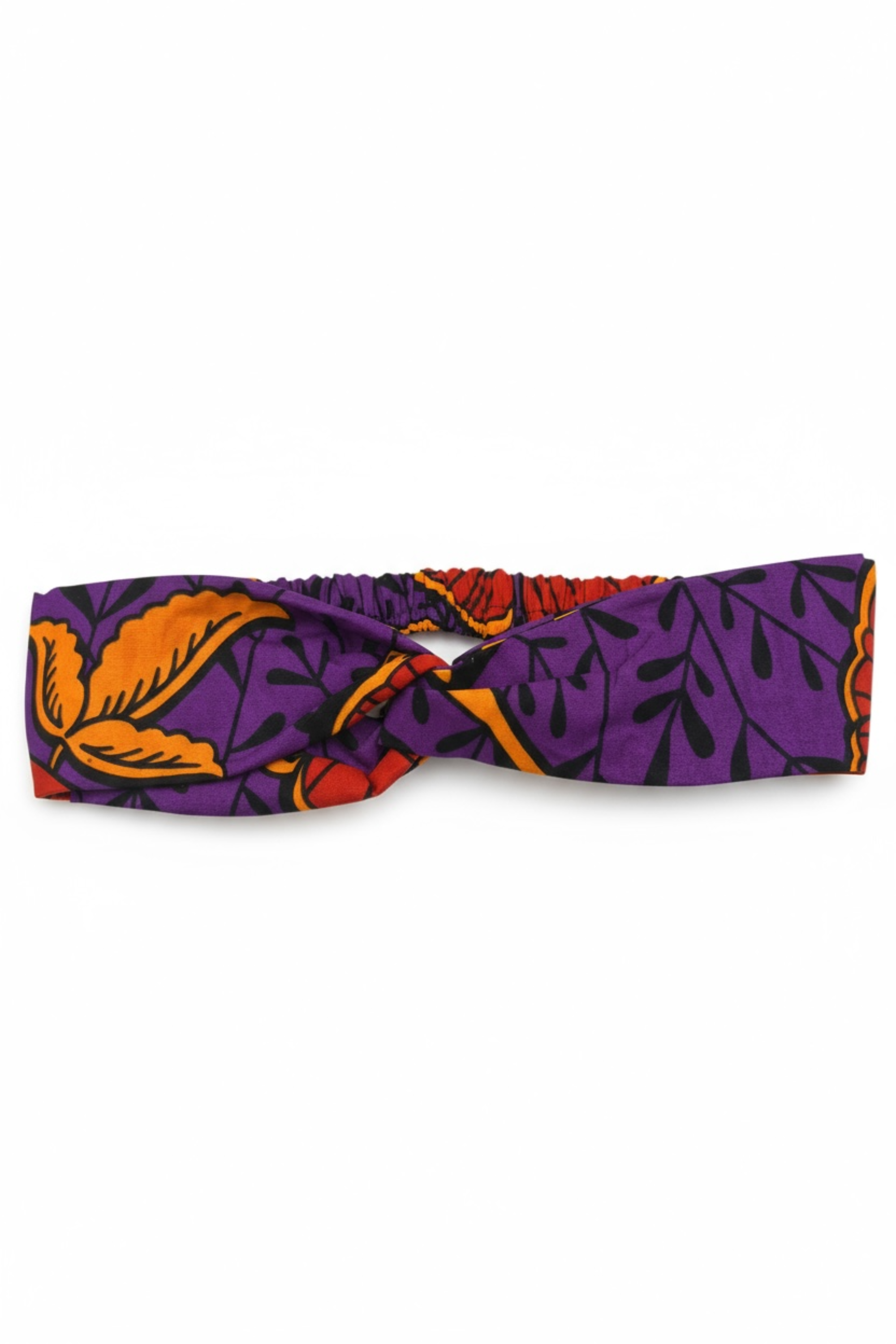 Détail des motifs floraux violet, orange et rouge du bandeau en wax africain Makomie